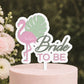 Bride To Be Pink Flamingo and green monstera leaf on white cake topper for hen's do. 
