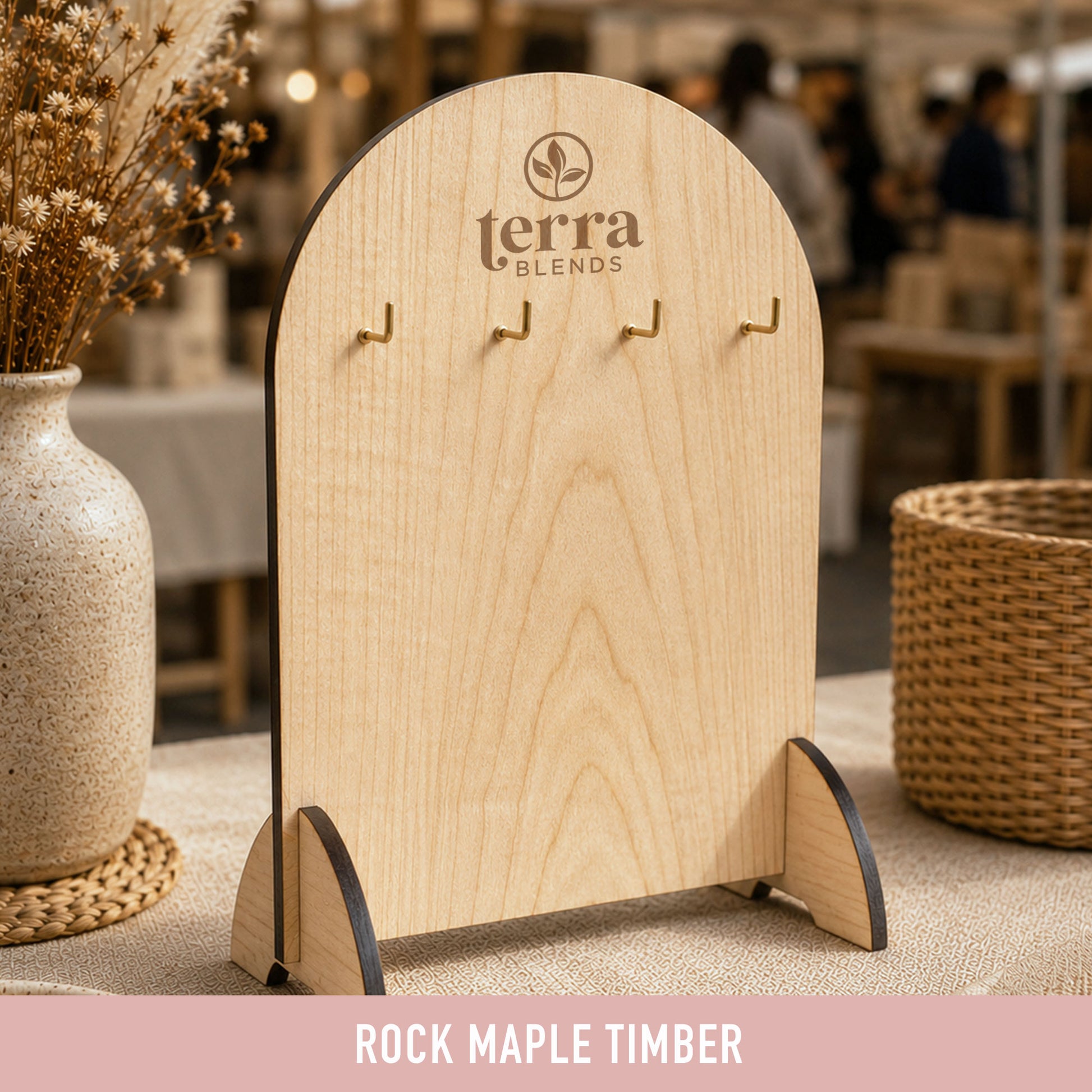 Personalised Rock Maple timber keyring display stand with custom engraved logo and four brass hooks for markets and retail displays.
