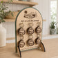 Close-up of a custom branded keyring display stand and engraved wooden keyring set.