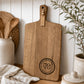 Custom personalised cheeseboard for a birthday, engraved wooden serving board made from premium acacia timber with milestone birthday design.
