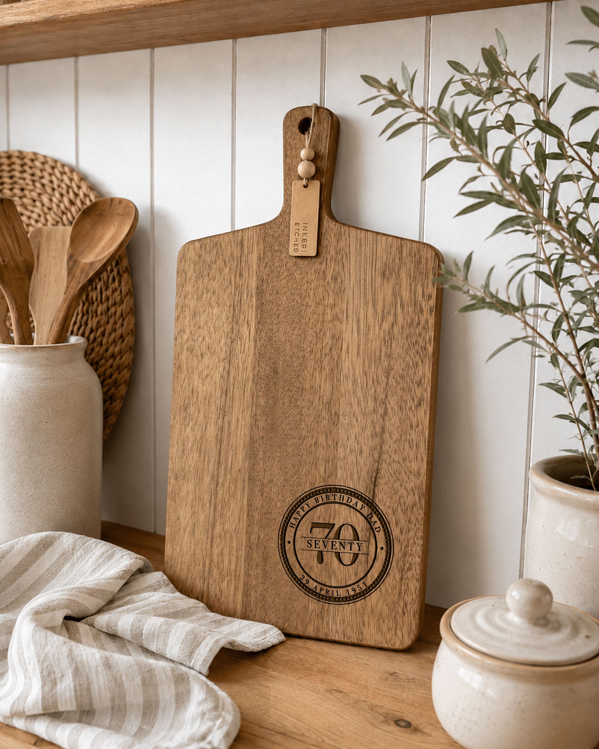 Custom personalised cheeseboard for a birthday, engraved wooden serving board made from premium acacia timber with milestone birthday design.
