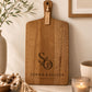 Custom paddle serving board personalised with names, ideal as a wedding, anniversary or housewarming gift.