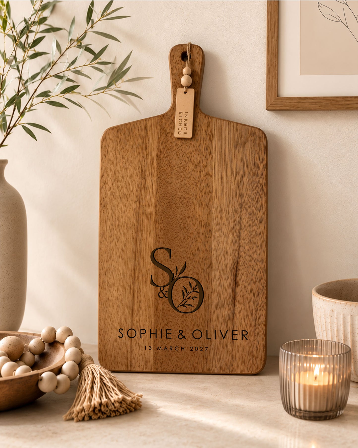Custom paddle serving board personalised with names, ideal as a wedding, anniversary or housewarming gift.