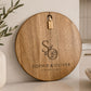 Personalised couple cheeseboard engraved with names and date, ideal wedding or anniversary keepsake.