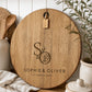 Personalised wedding serving board engraved with couple initials, names and wedding date on premium acacia timber.