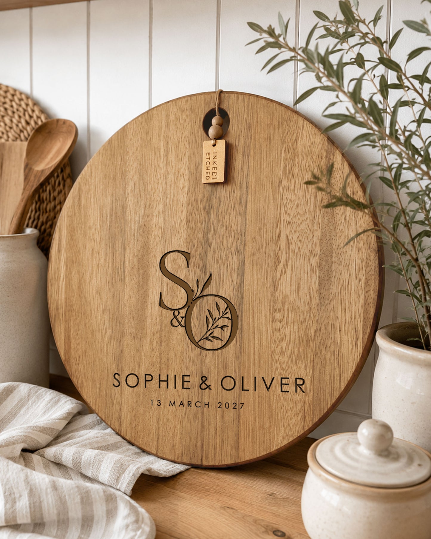 Personalised wedding serving board engraved with couple initials, names and wedding date on premium acacia timber.