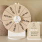 Printed beige Spin The Wheel with Laurel Blends logo and prize segments, displayed with matching Spin To Win sign.