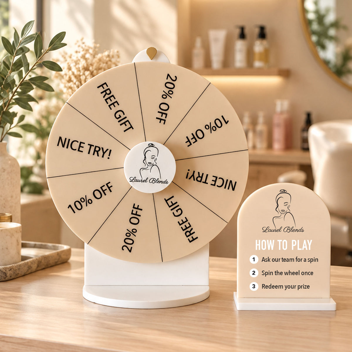 Printed beige prize wheel and matching Spin To Win sign on a timber counter in a warm beauty salon.