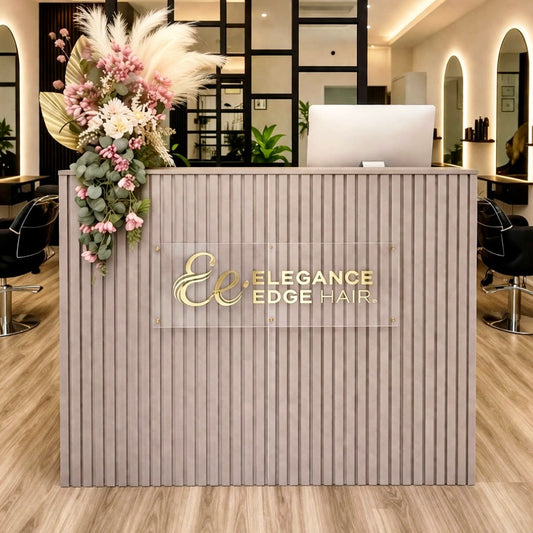 Gold logo signage on rectangle desk mounted sign on standoffs. 
